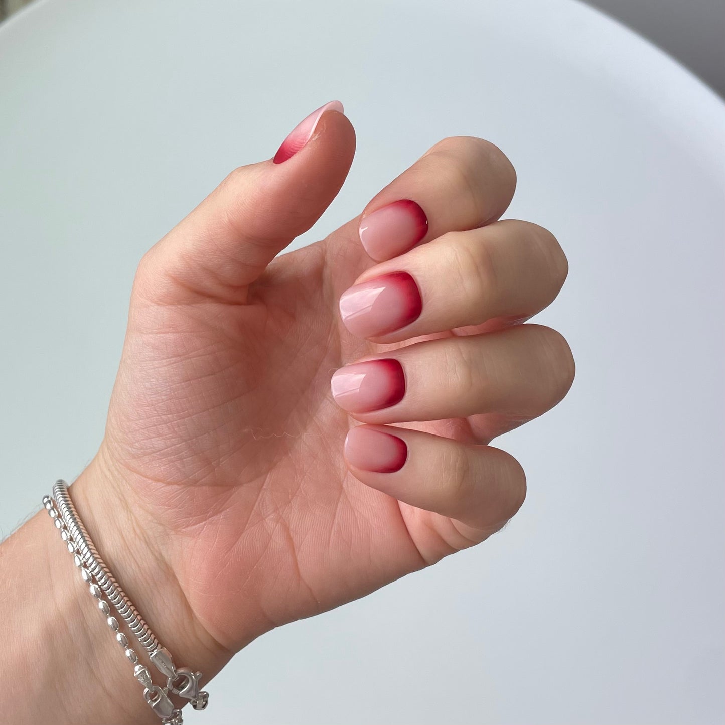 Bare minimum false press-on nails with a spooky season twist. Halloween costume nails. Bloody nails. Beauty products for spooky season.