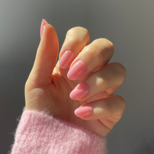 Candy Claws press-on acrylic false nails in mid-pink colour in the shortest style