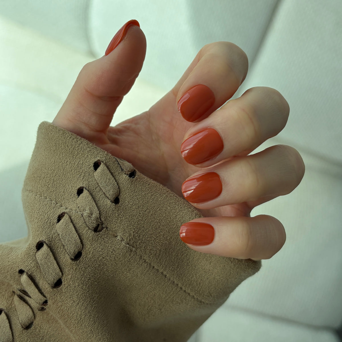 Salon quality reusable pumpkin spice false nails in a burnt orange colour for Halloween 