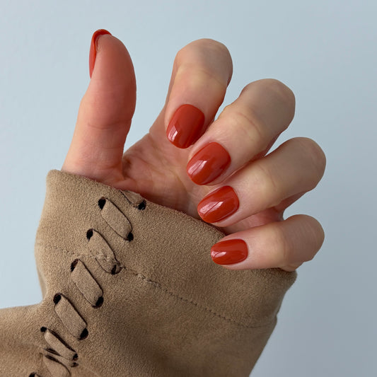 Reusable salon quality extra-short press-on nails in burnt orange colour for Halloween