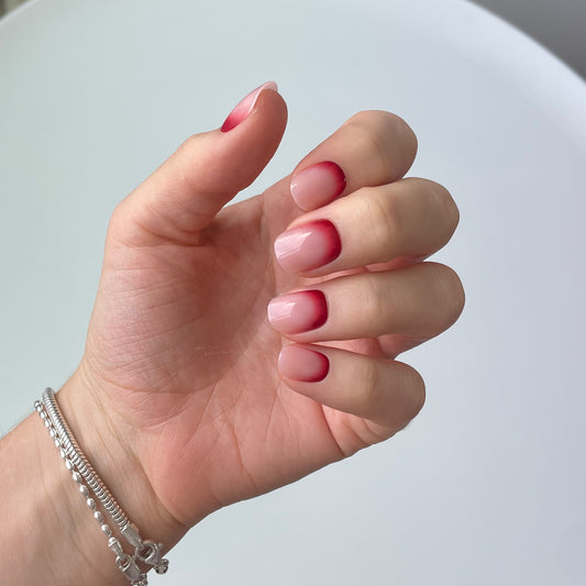 Bare minimum false press-on nails with a spooky season twist. Halloween costume nails. Bloody nails. Beauty products for spooky season.
