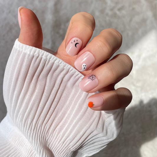 Candy Claws bare minimum extra short fake press-on nails with Halloween nail art for spooky season. Little ghost, spider web, moon & stars.