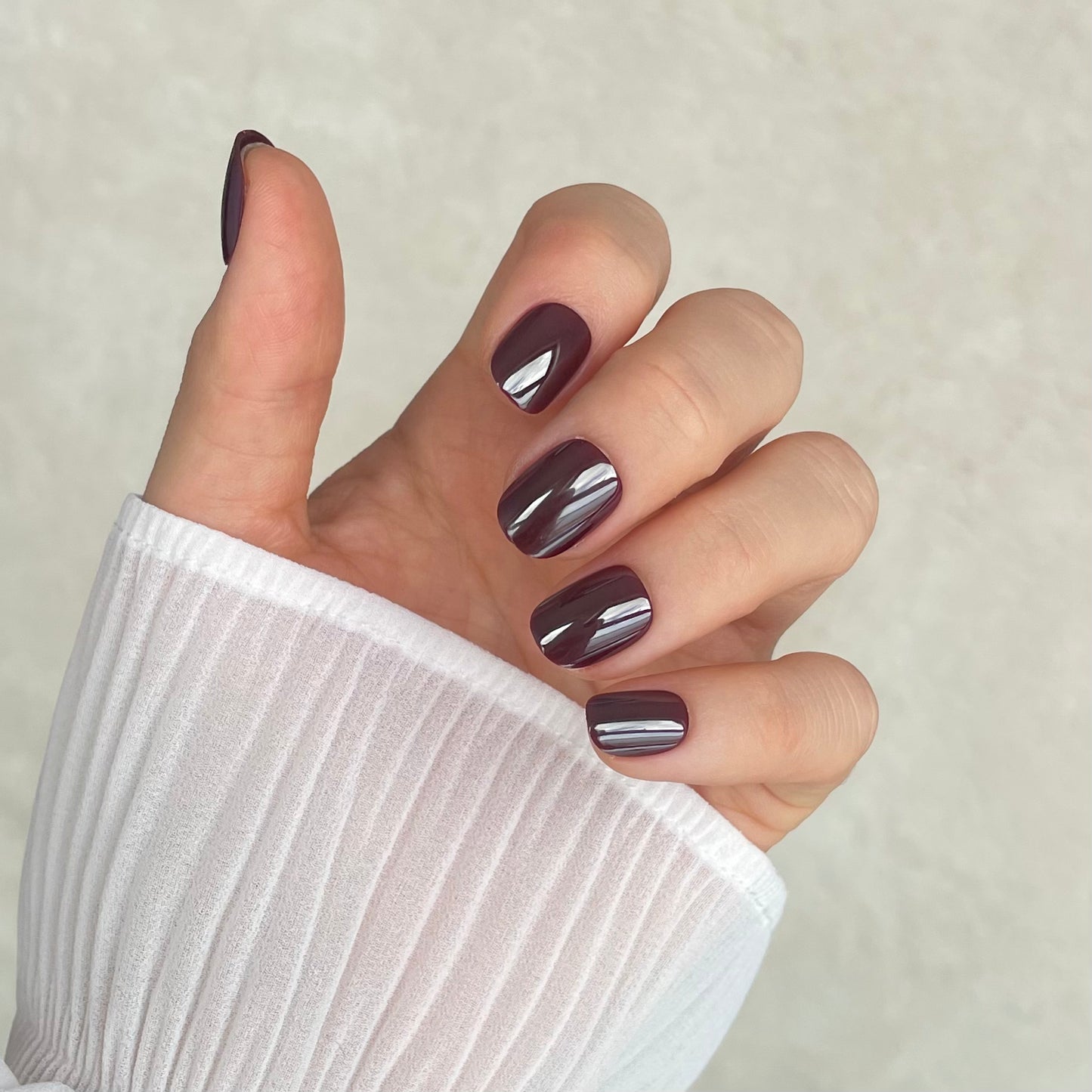 Sour grape colour fake acrylic nails with chrome glaze for Halloween. Perfect for spooky season. Salon-quality and professional finish at home.
